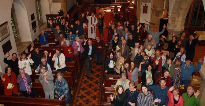 Church congregation waving 670